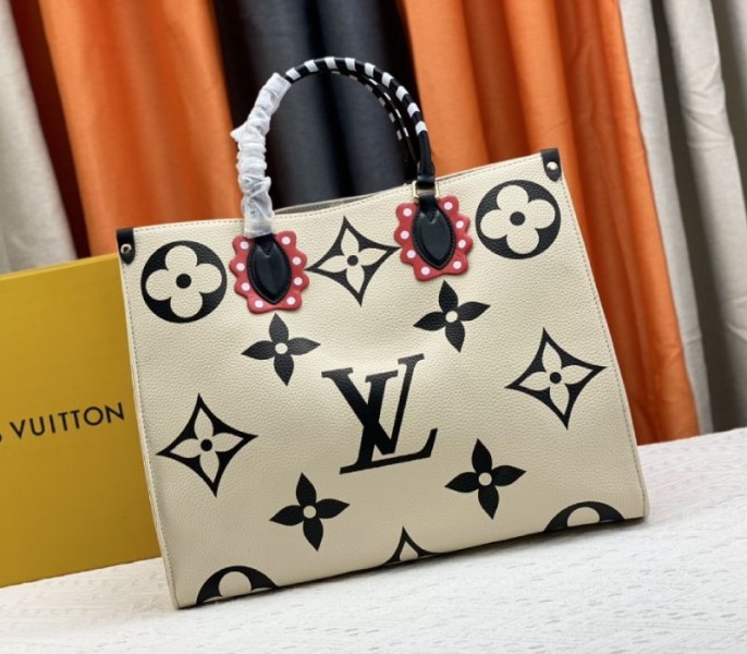 Fake Louis Vuitton Monogram Empreinte Leather Crafty OnTheGo GM Tote In Cream