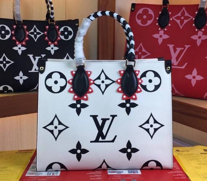 Fake Louis Vuitton Monogram Empreinte Leather Crafty OnTheGo MM Tote In Cream